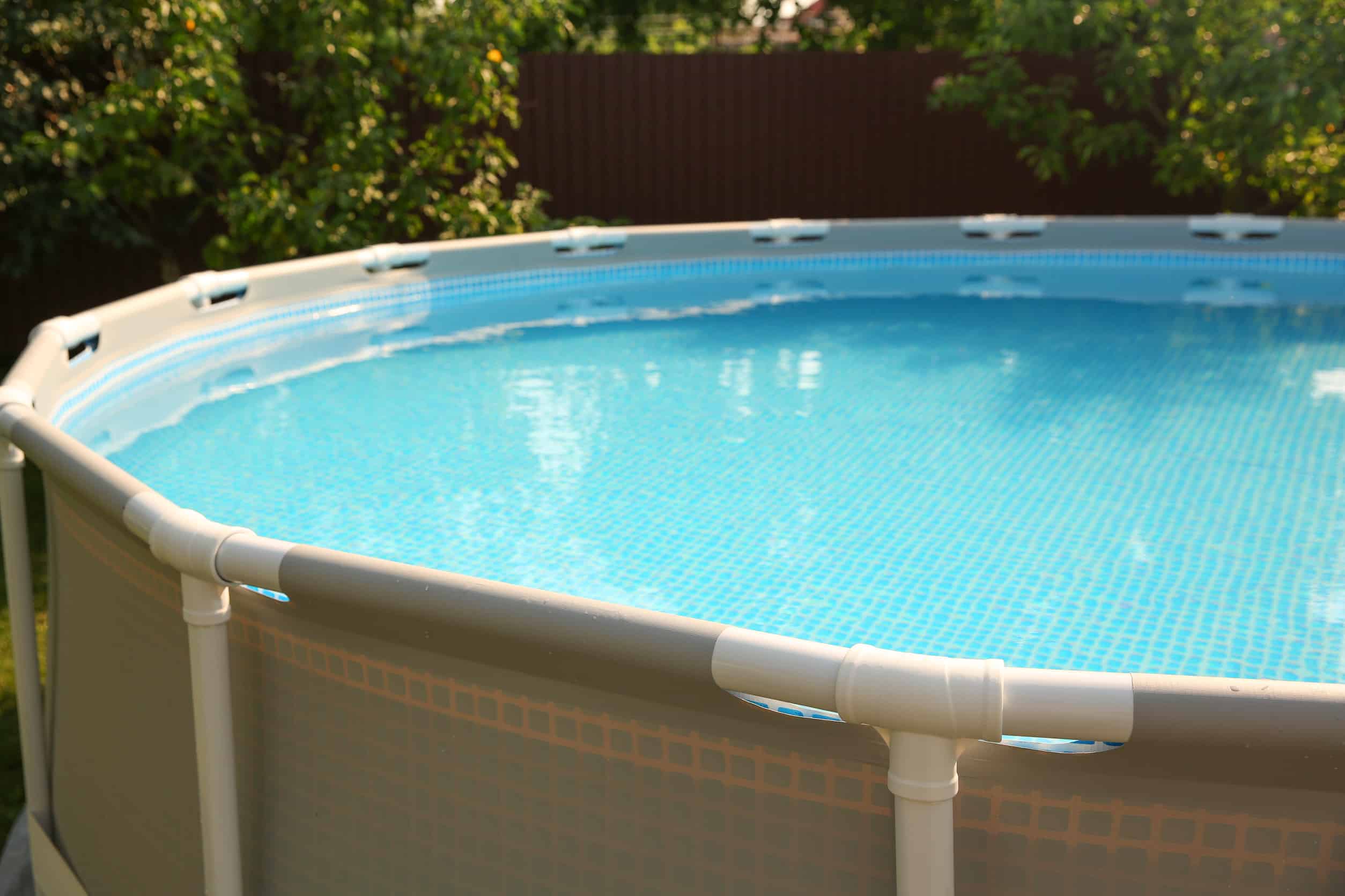 above ground swimming pool outdoors on sunny day, closeup